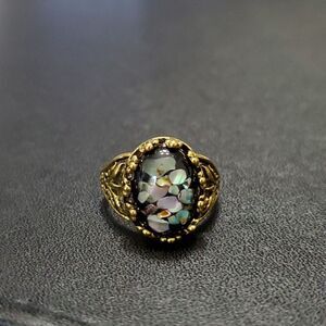 **Final Sale** Gold tone ring with abalone pieces